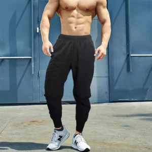 Calças masculina de fitness, 2023 verão, sólida fina solta splice cintura elástica bolso inferior casual hip hop esporte velocidade