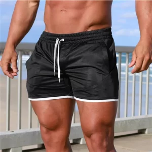 Shorts/Calções masculino esportivos de praia fitness, ginástica de verão, calções de malha respirável, roupa esportiva de secagem rápida, jogger, calças curtas