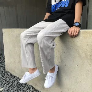 Calça casual de seda gelada masculina, streetwear, solta plissada, monocromática, moda coreana, verão.