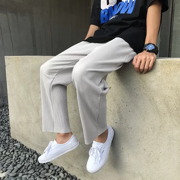 Calça casual de seda gelada masculina, streetwear, solta plissada, monocromática, moda coreana, verão.