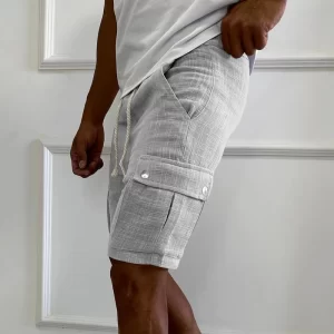 Bermuda monocromática masculina, de cintura média, bolsos da moda, costura, calça casual, streetwear, moda verão.